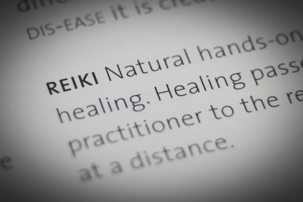 The word Reiki close up on paper